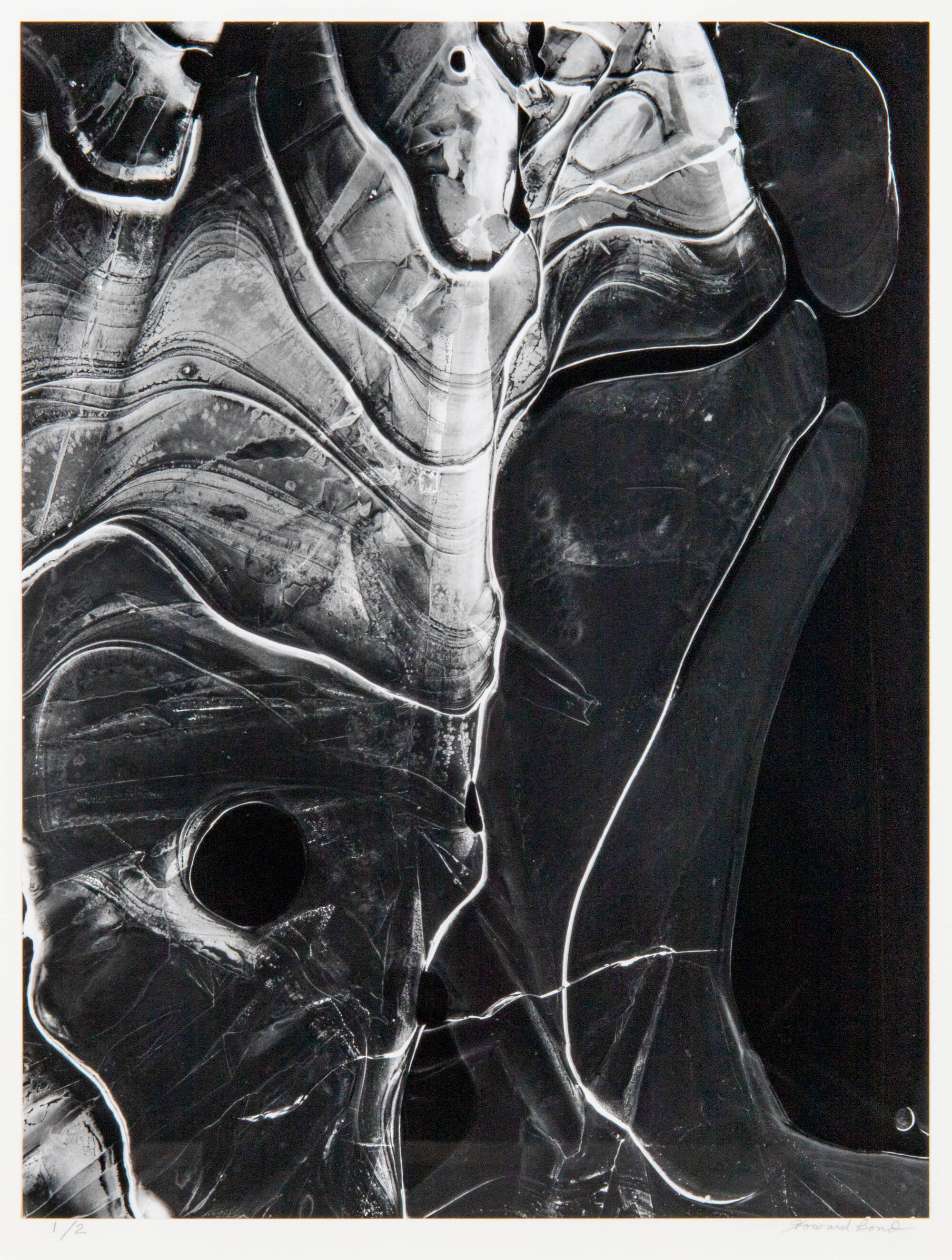 Black and white photograph of a close-up of ice.